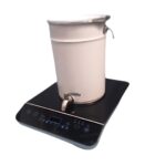 Inductieplaat incl. leeg blik voorzien van aftapkraan